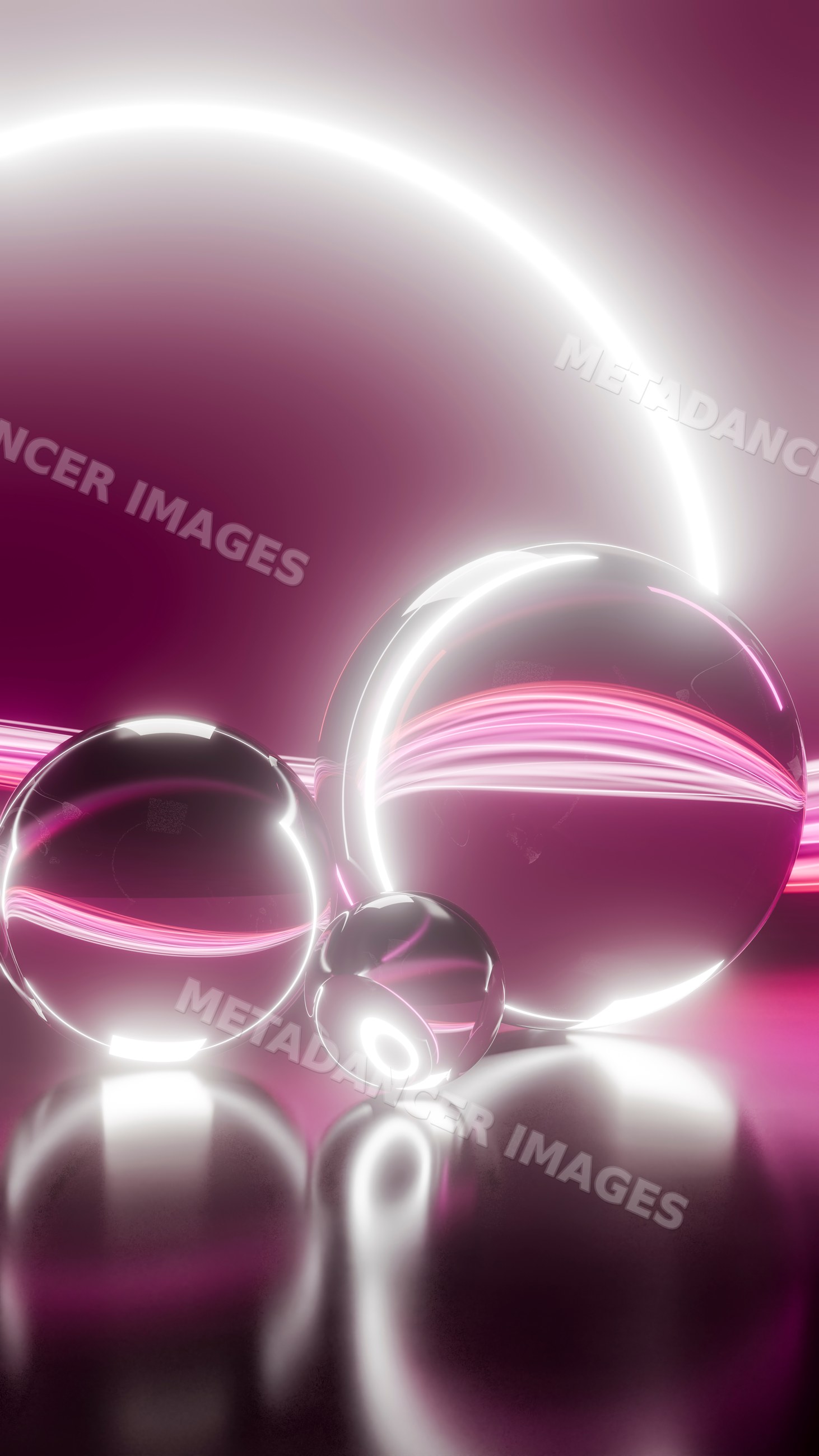 Three reflective glass spheres illuminated by neon pink light