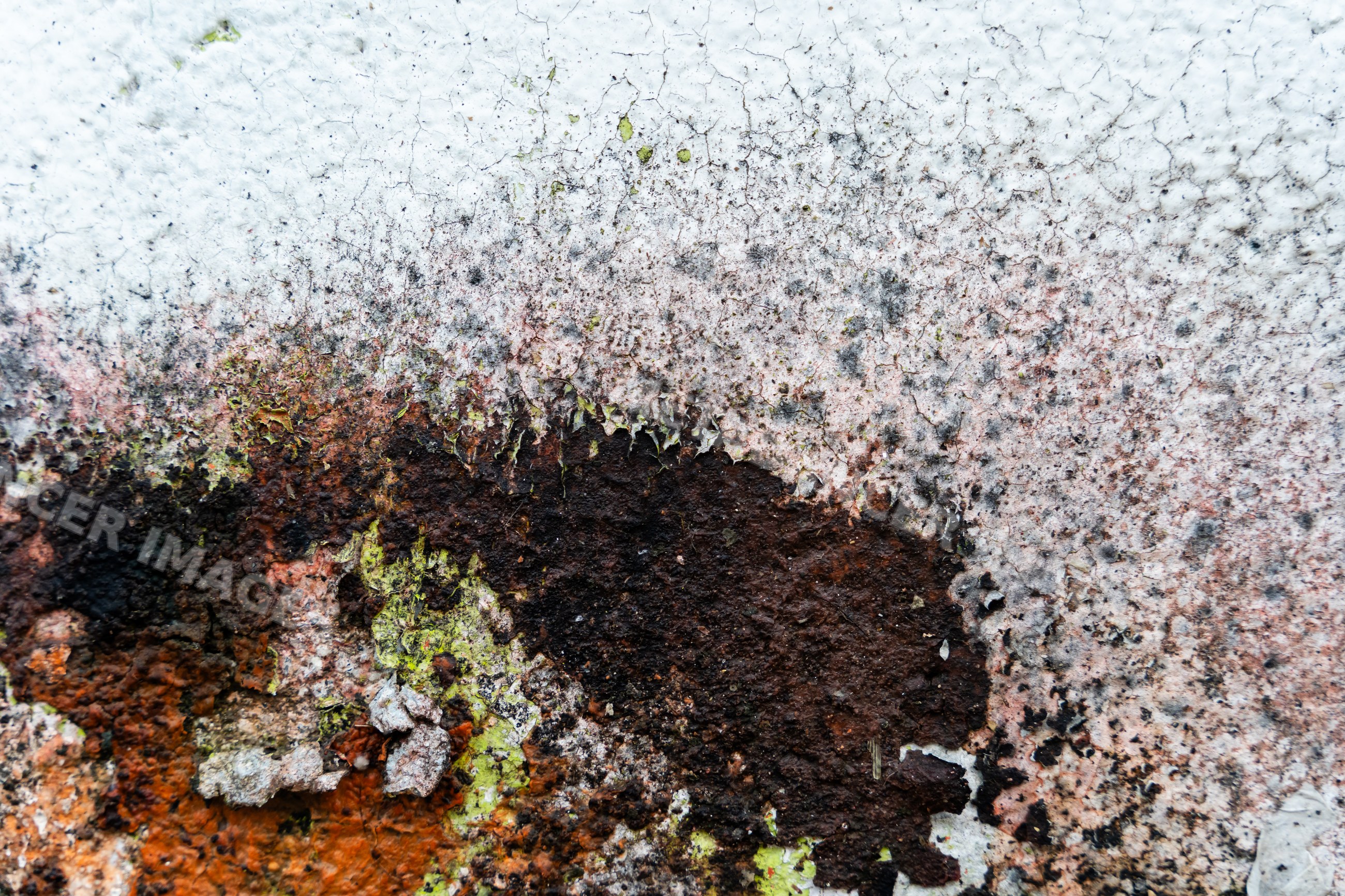 Peeling and rusted paint texture on weathered surface