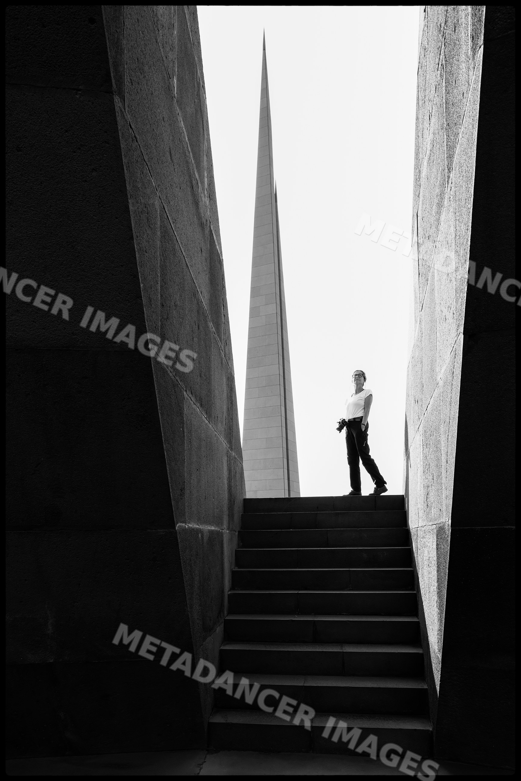 Person standing on stairs at Armenian Genocide Memorial