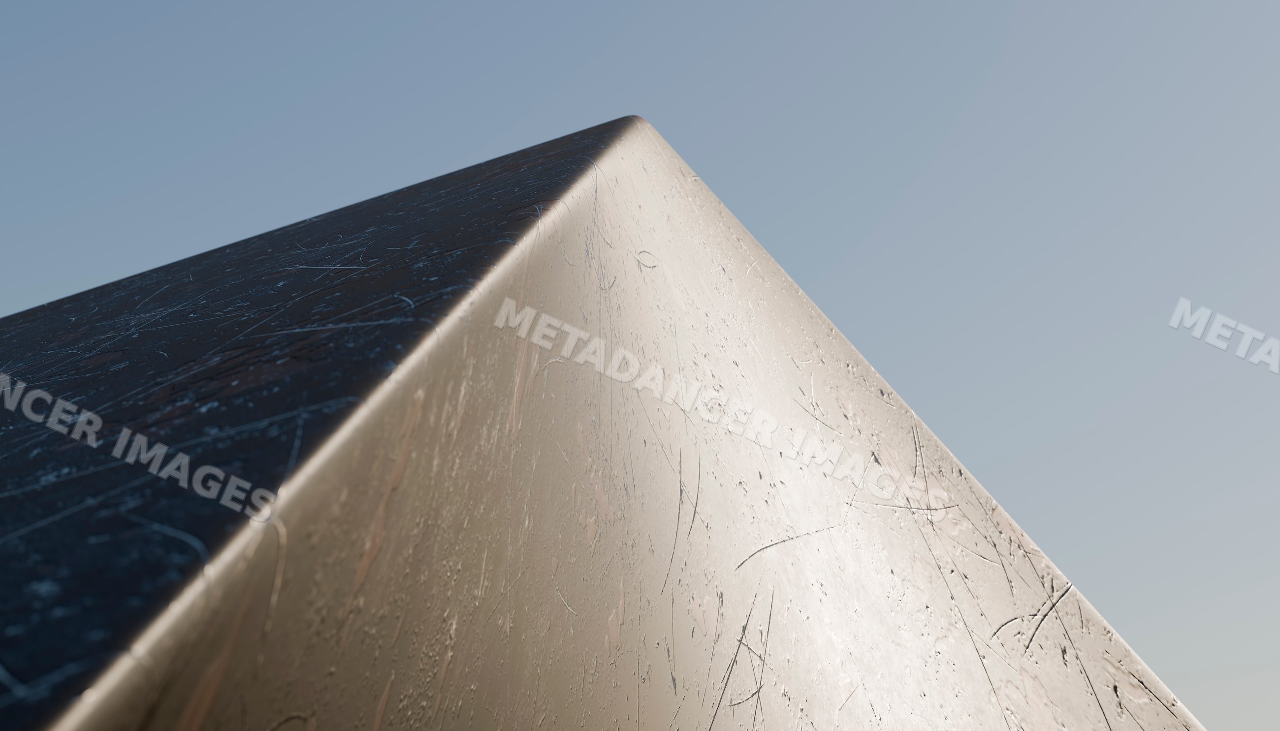 Close-up of a scratched shiny metal corner reflecting light outdoors
