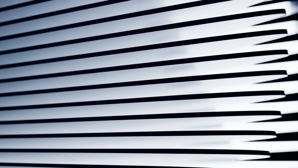 Abstract pattern of horizontal black lines casting shadows