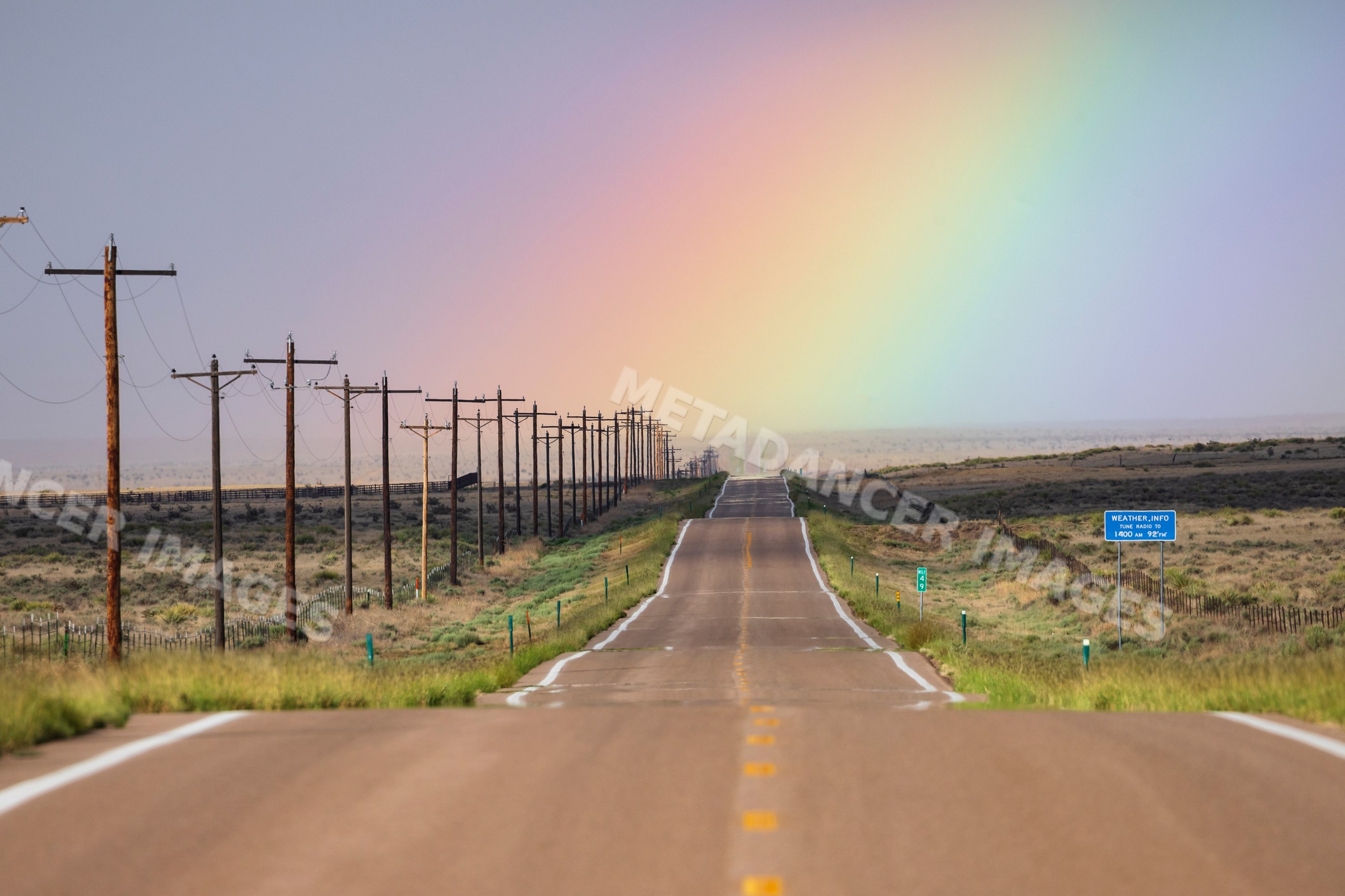 Rainbow over Highway in rocky ford, colorado, USA