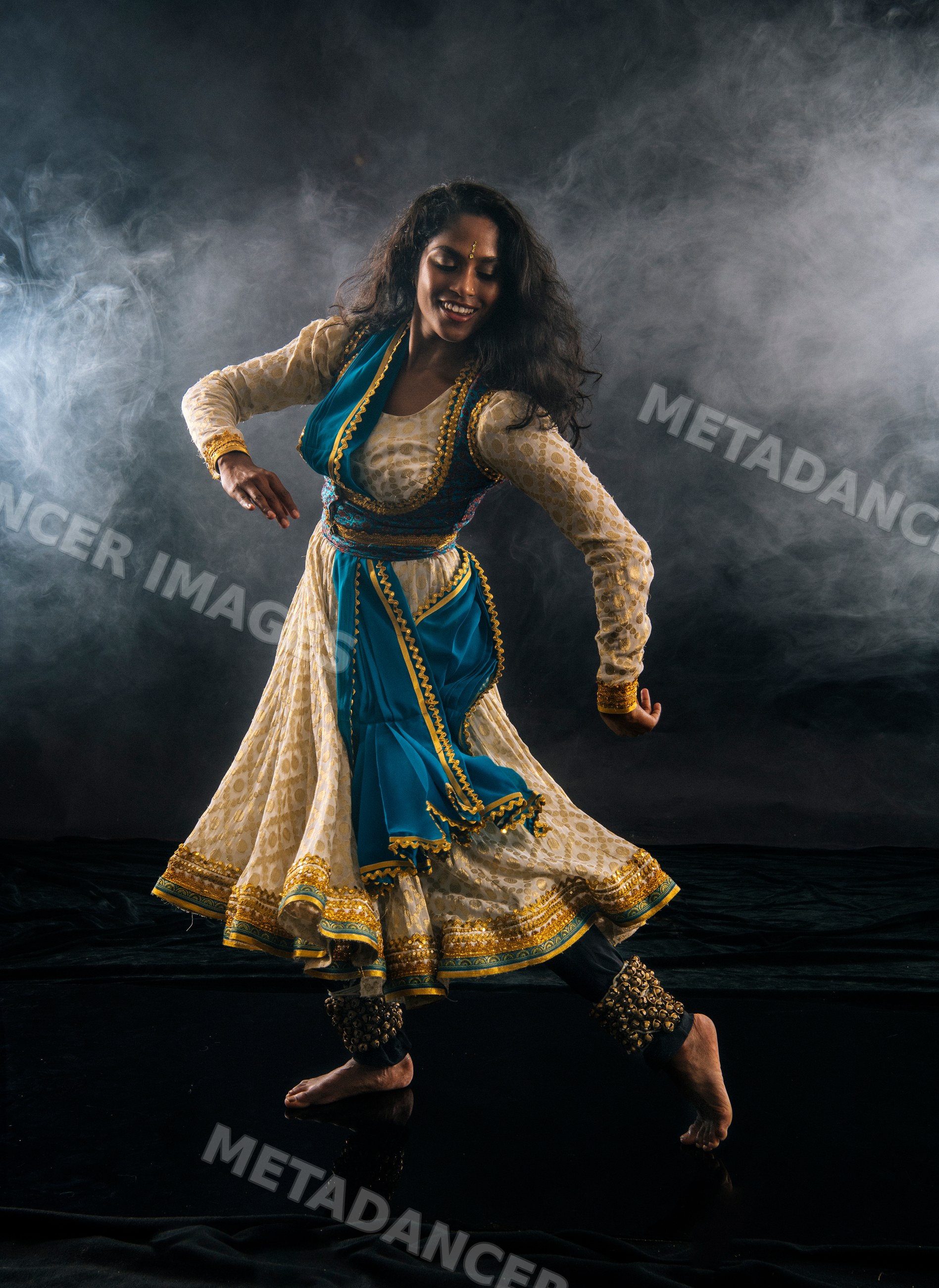 Indian classical South Asian dancer performing with ankle bells