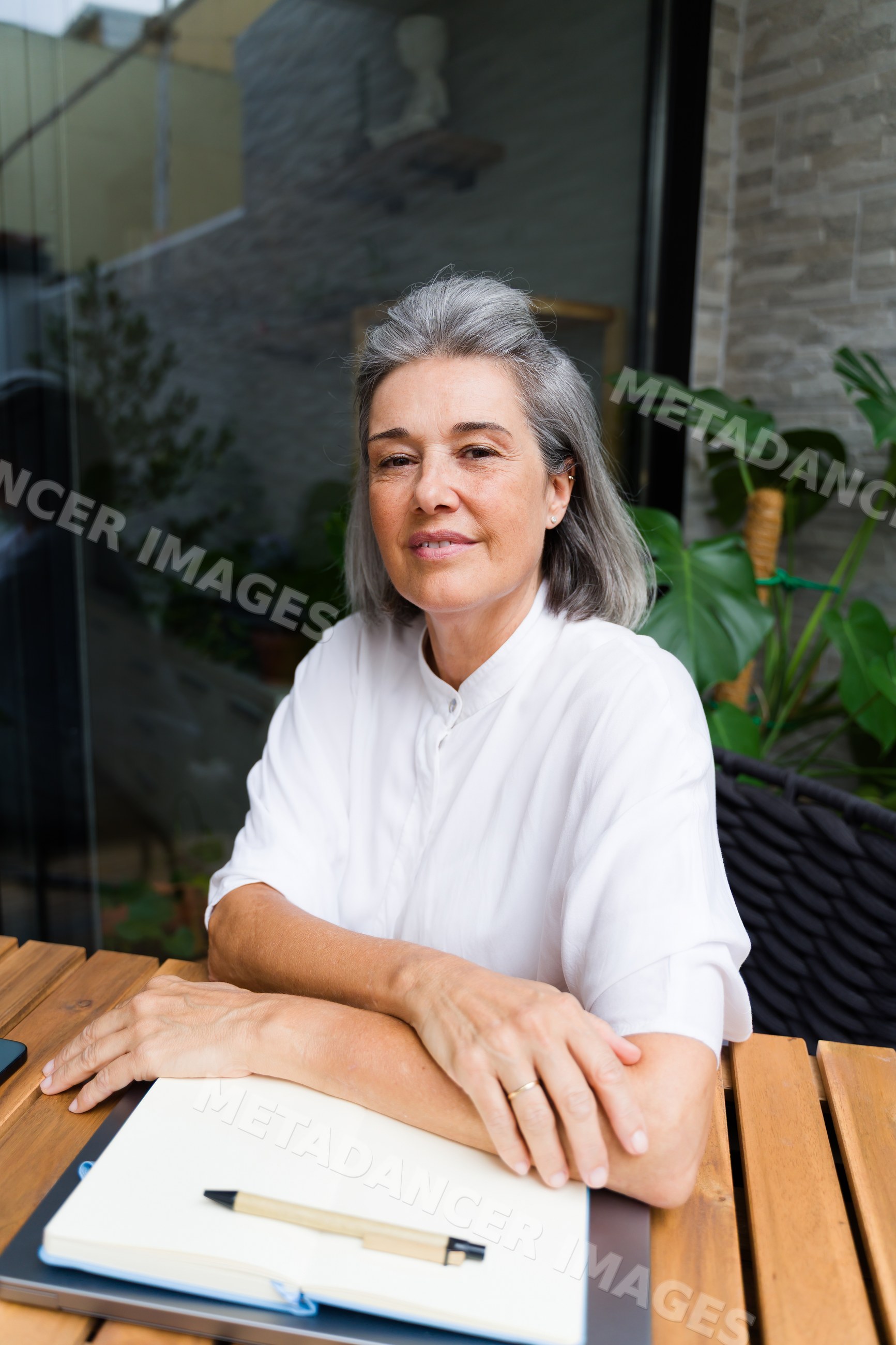 Middle-aged white woman sitting