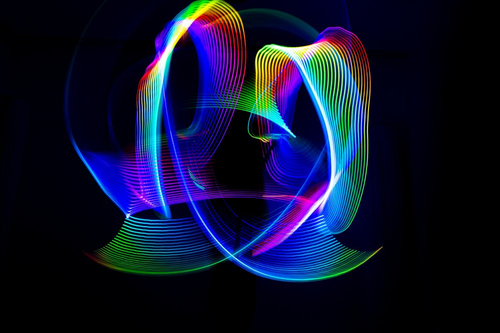 Multicolored led light painting with abstract vibrant trails