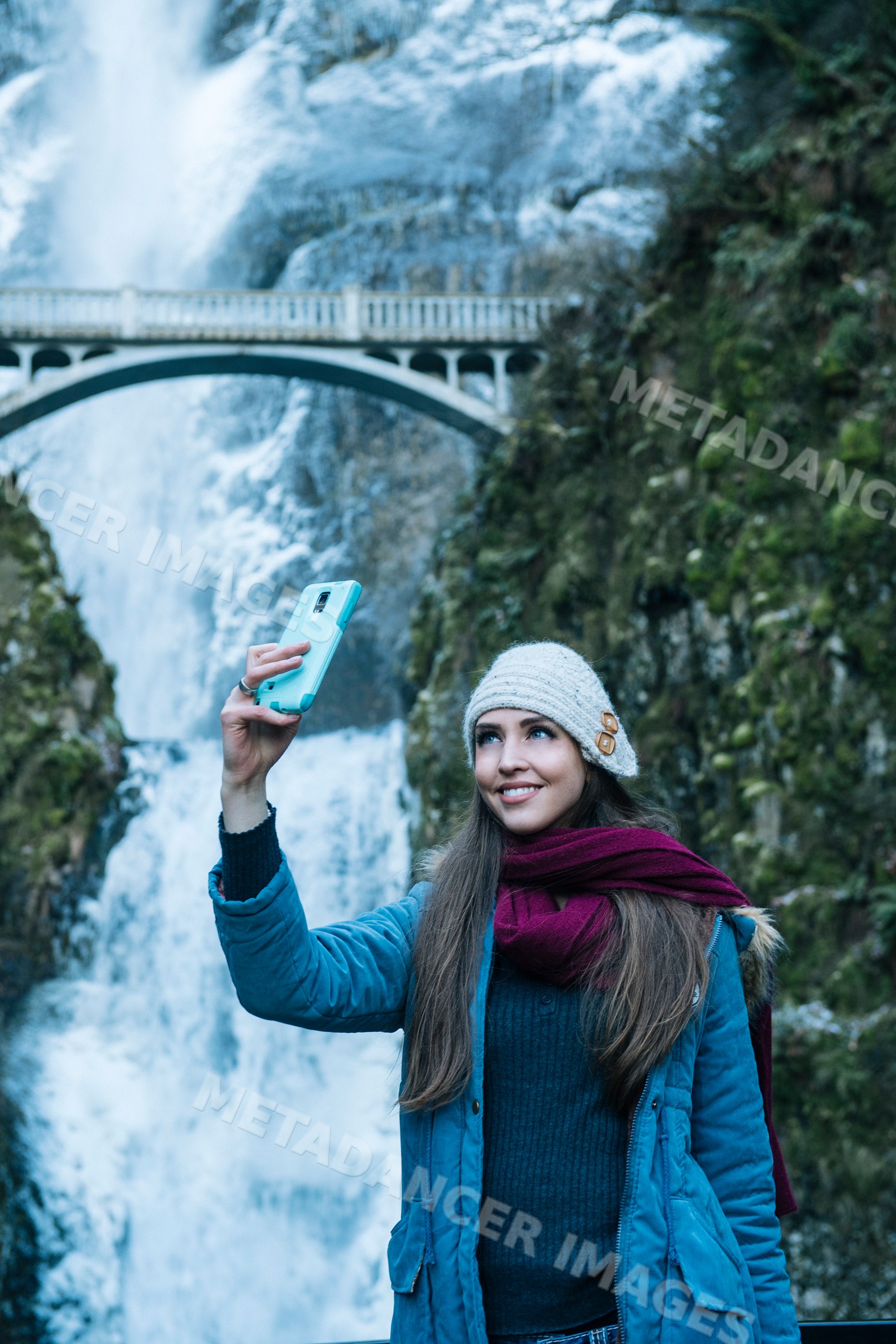 White woman taking selfie