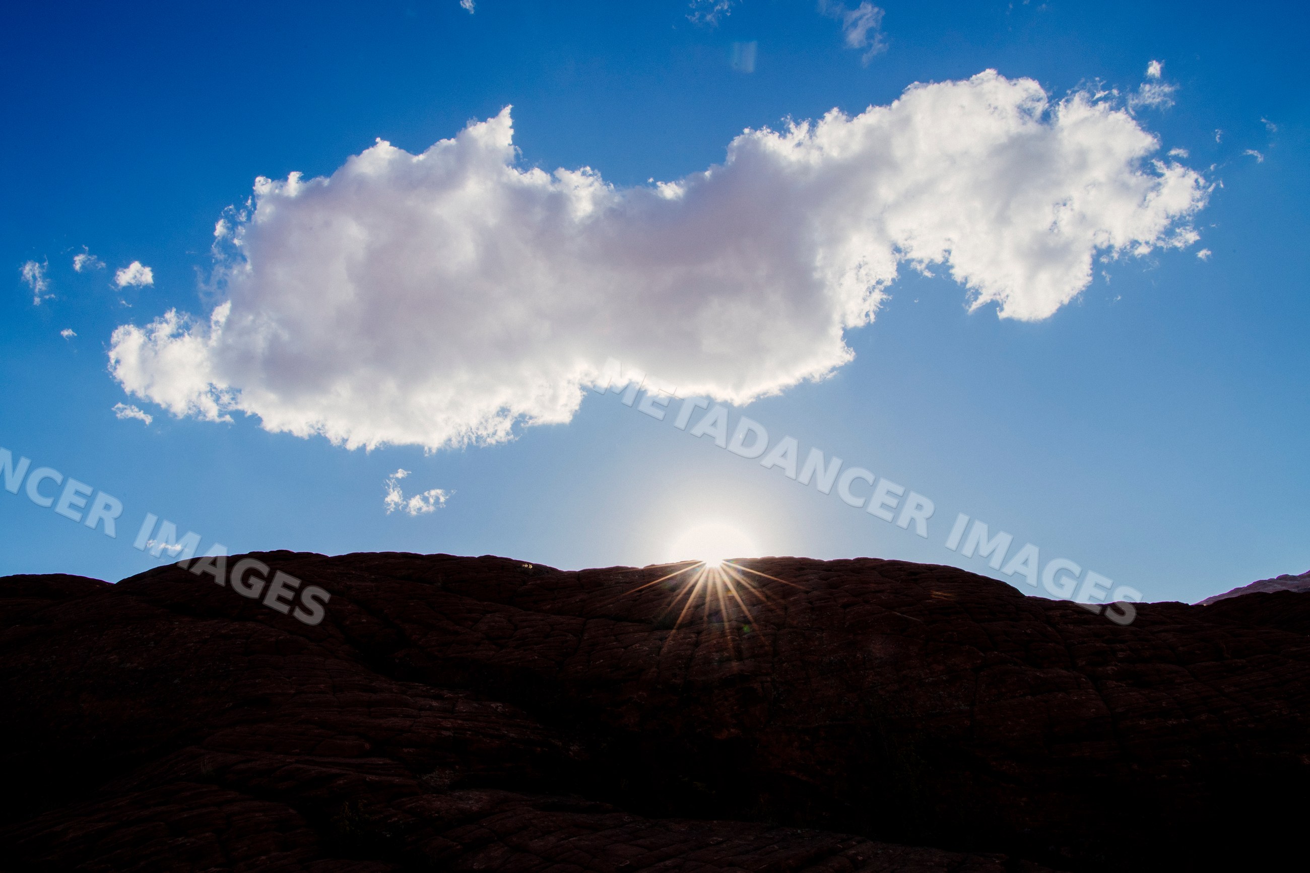 Sunset over rock formations at red Cliffs Desert State Park