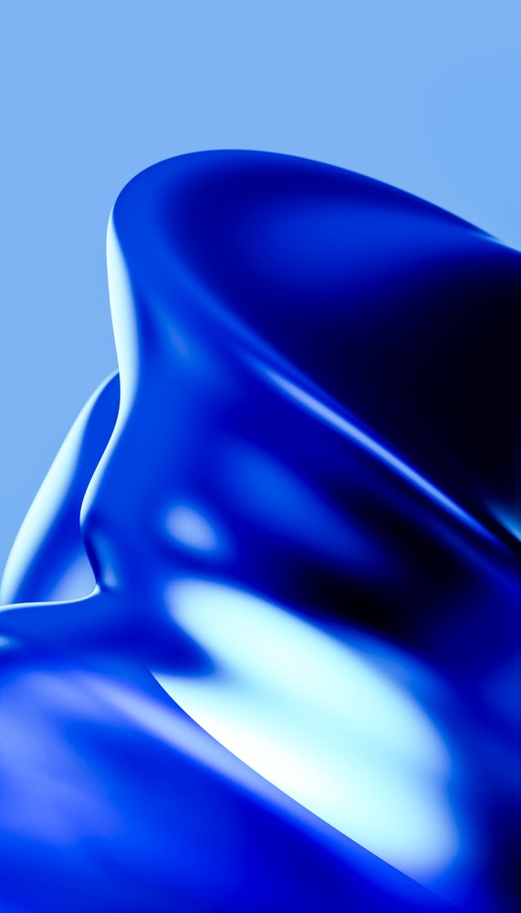 Closeup of blue satin fabric with smooth shiny folds