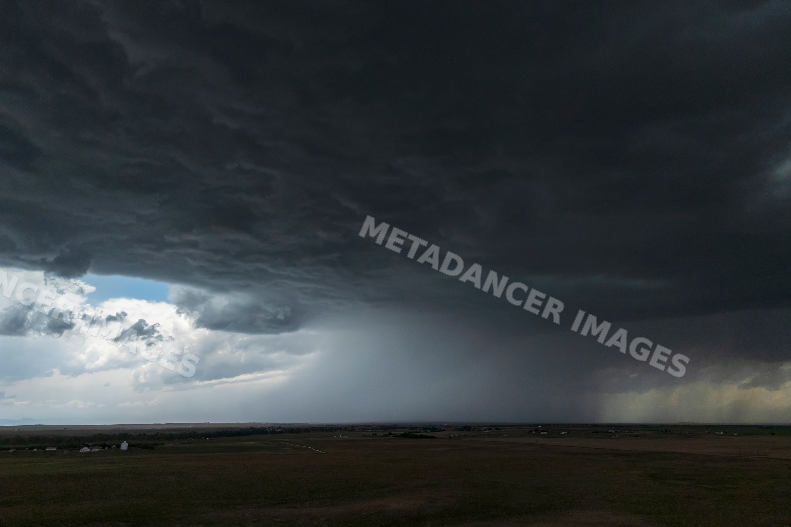 Storm clouds and rain over Great Plains near byers, colorado