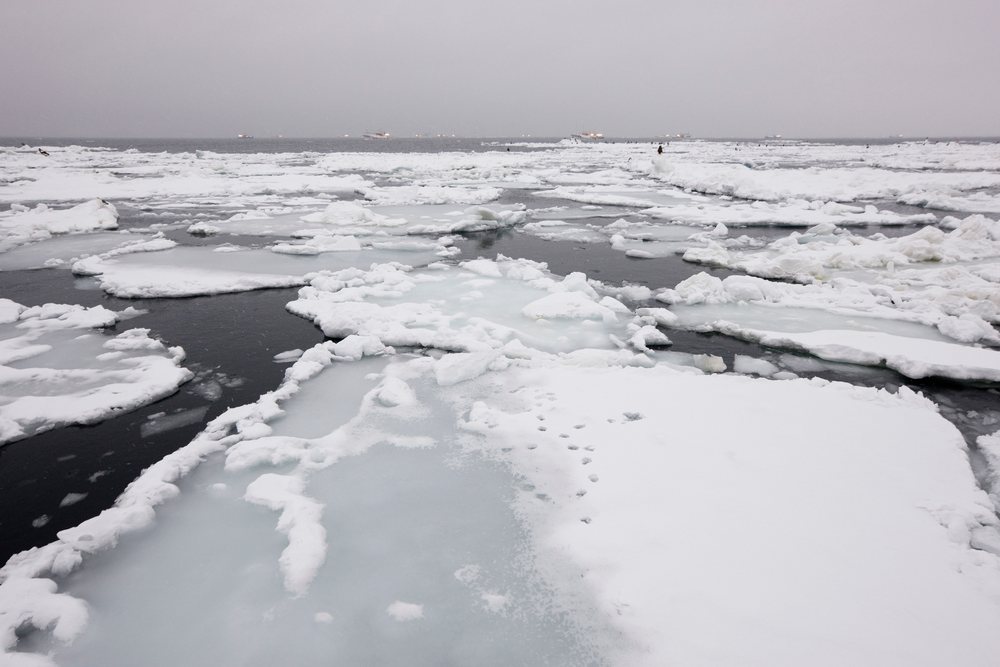 Ice floes and fishing boats, hokkaido, japan