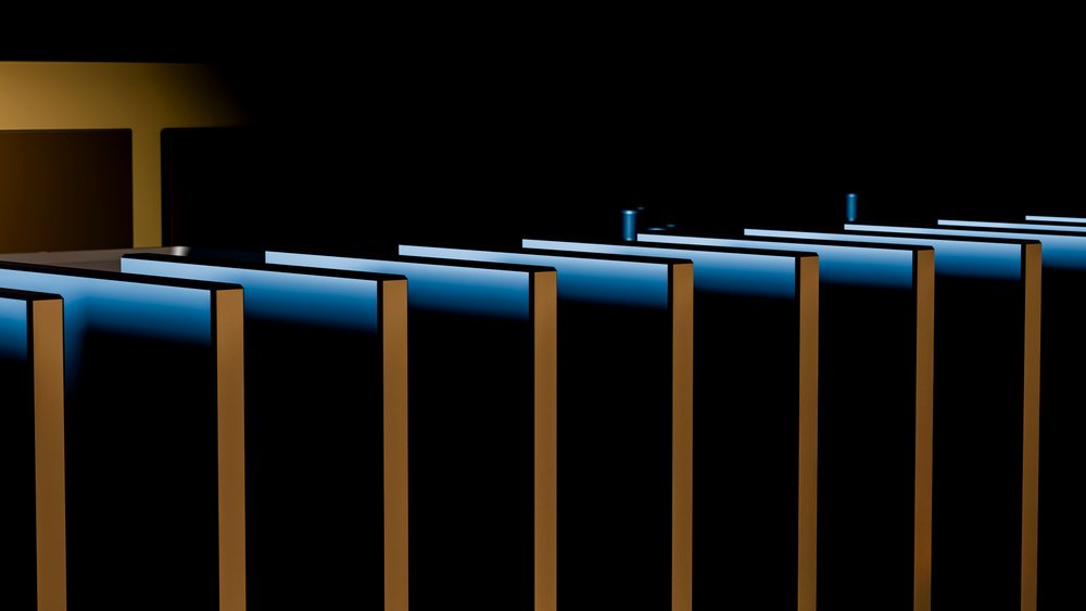 Close-up of illuminated computer keyboard with blue backlight