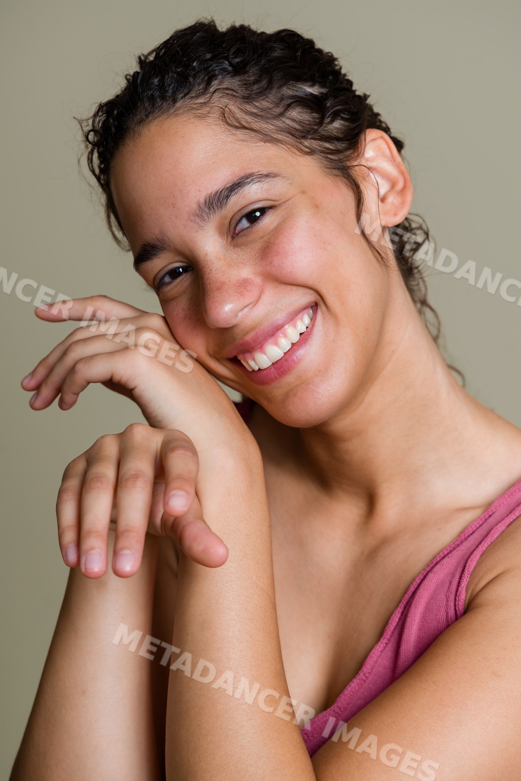 Smiling Hispanic woman posing with hands