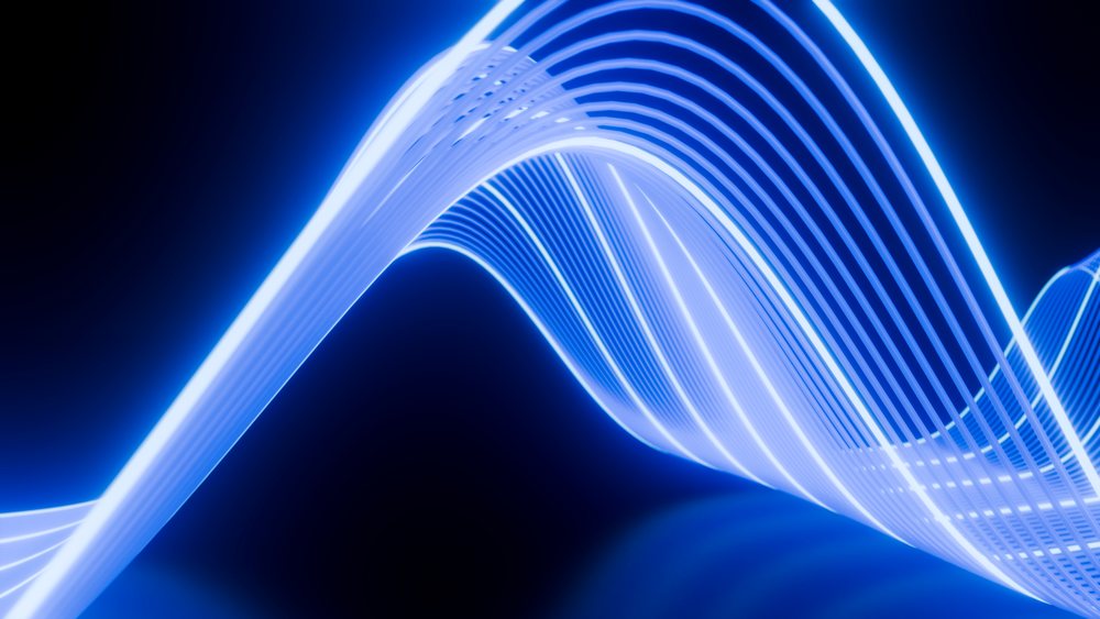 Blue glowing abstract wave with flowing light ribbons