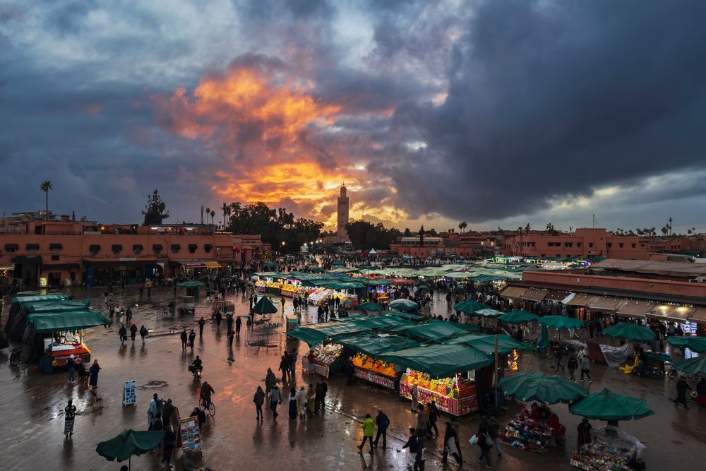 Jemaa el-fnaa Square at Dusk with market tents and people