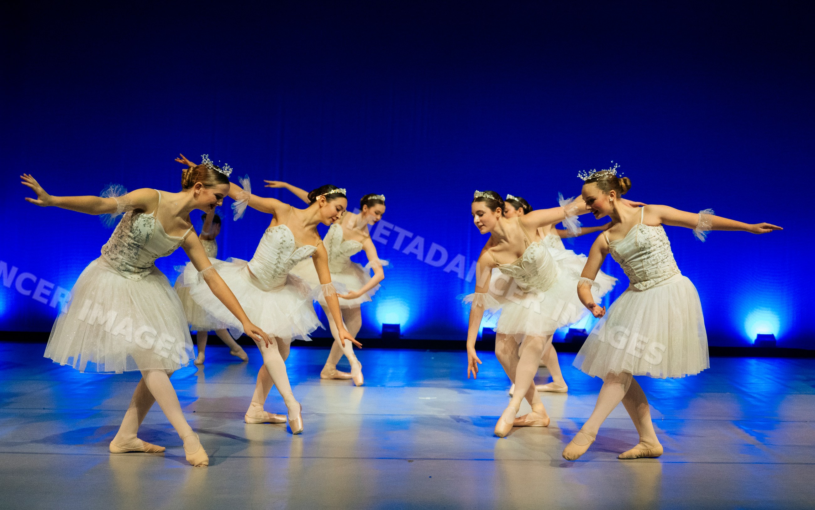 Ballet dancers performing a classic holiday ballet on stage