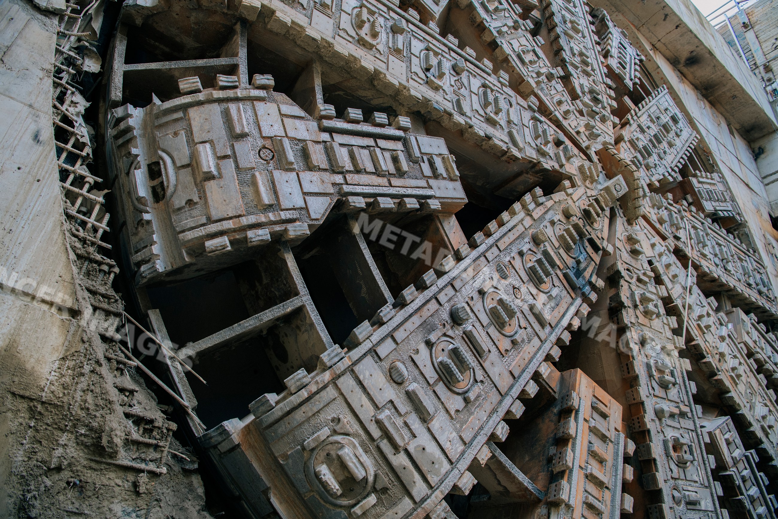 Close-up of the boring head of a tunnel boring machine drilling