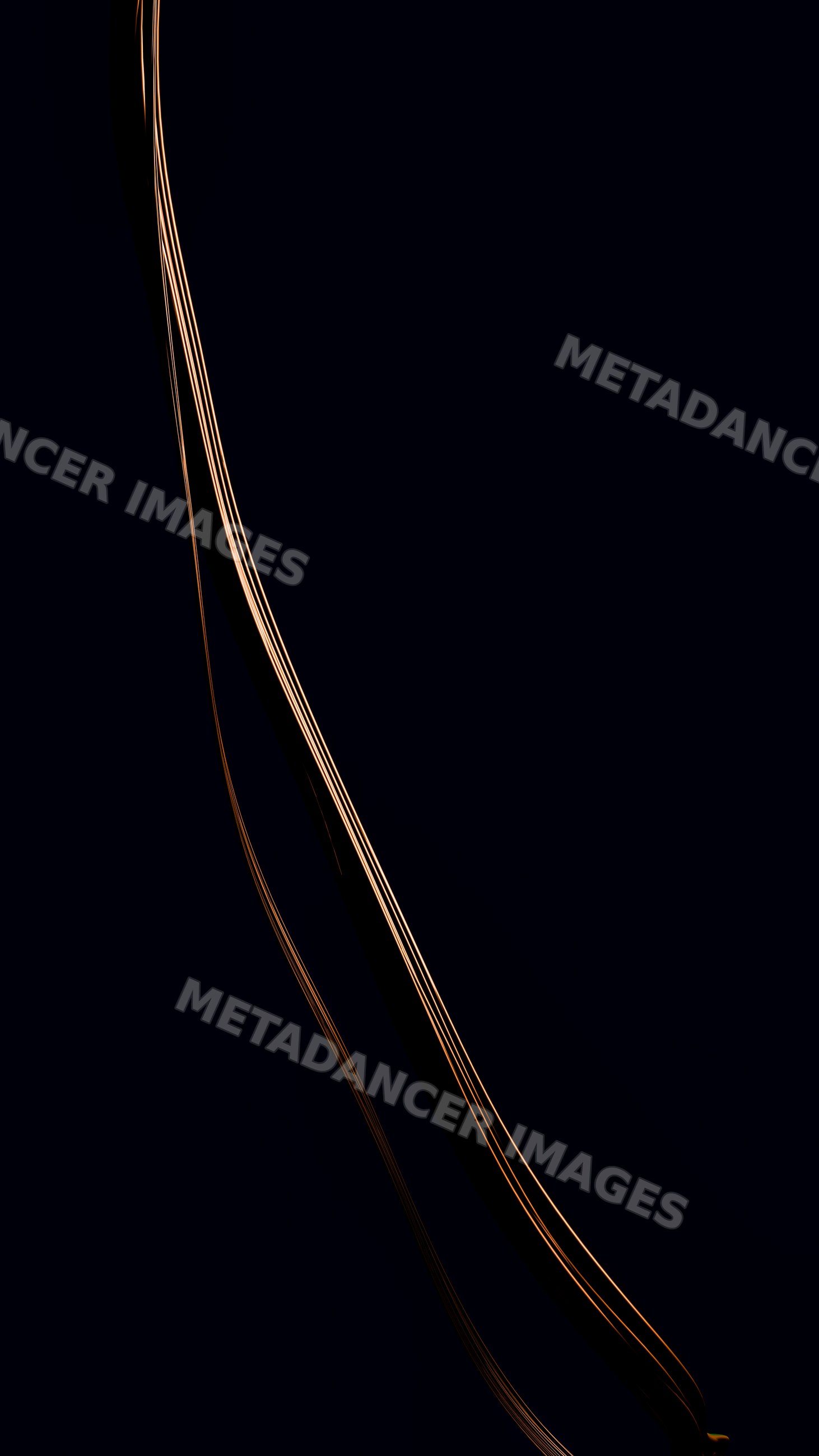 Abstract curved orange light trail on dark background