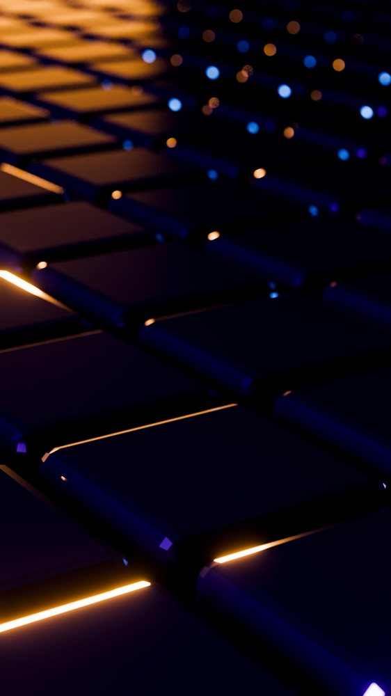 Close-up of black glossy tiles with glowing orange and blue lights