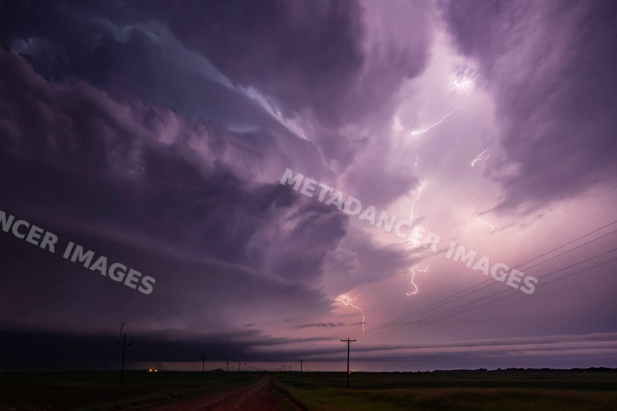 Lightning striking from a Tornado-Producing Supercell over rural north
