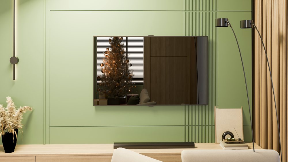Christmas tree reflected on tv screen in modern living room