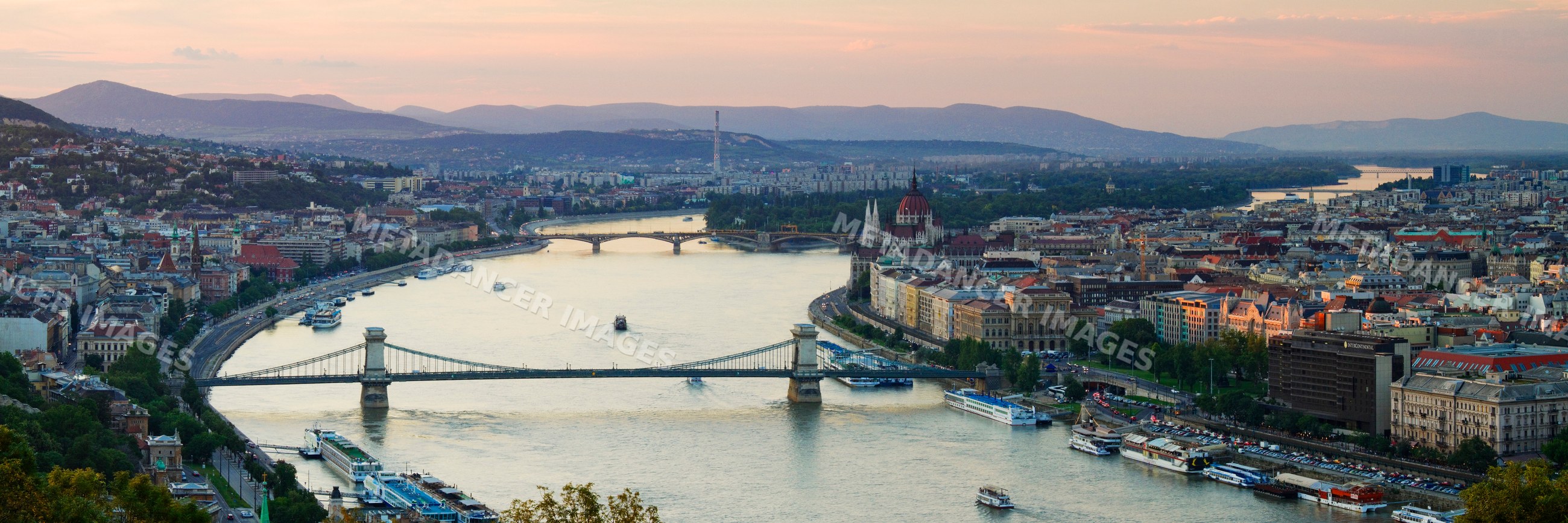 Panoramic danube river and bridges at sunset