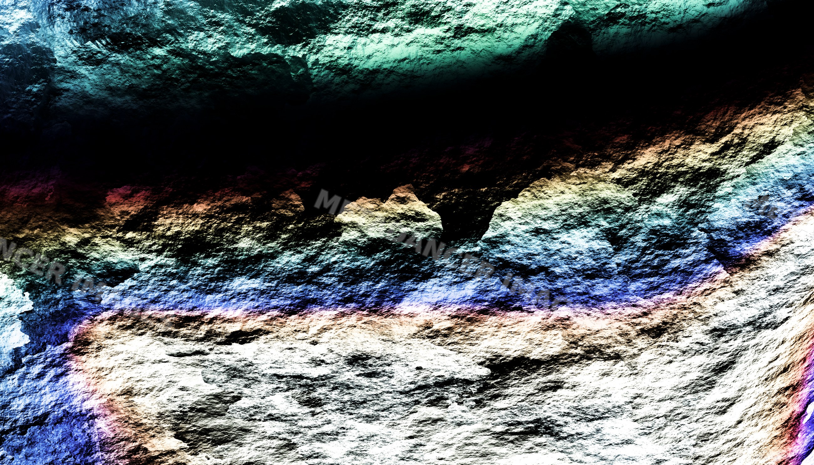 Close-up view of a textured rock surface with colorful mineral hues