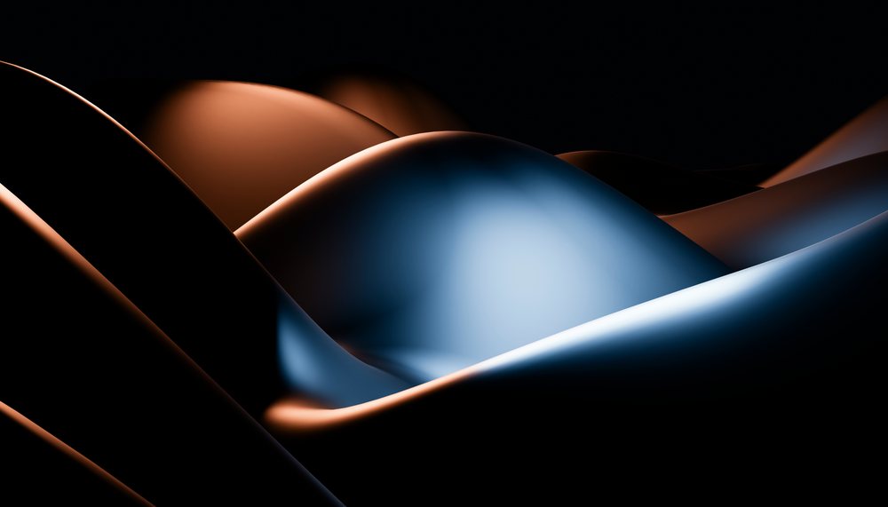 Abstract smooth blue and orange curved surfaces illuminated on dark
