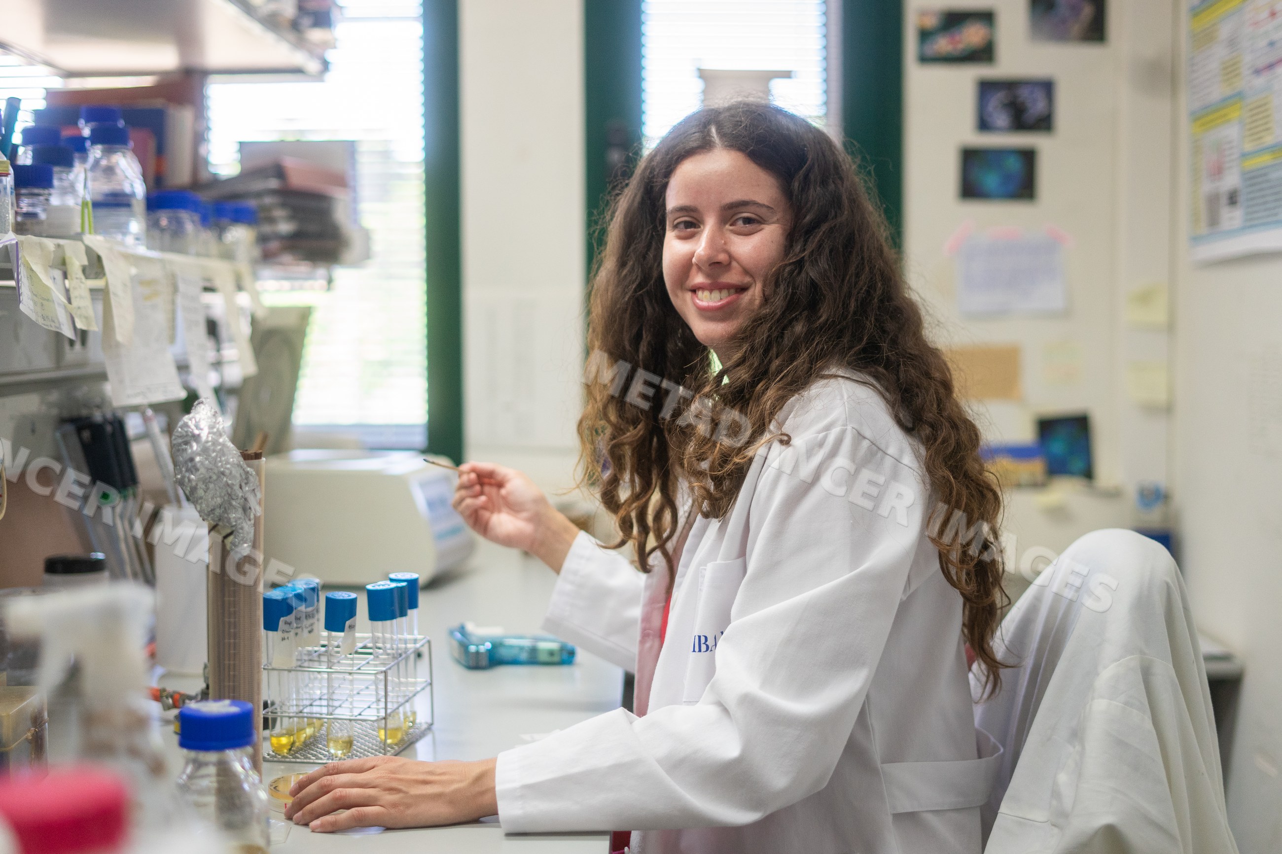 Female scientist working with test tubes