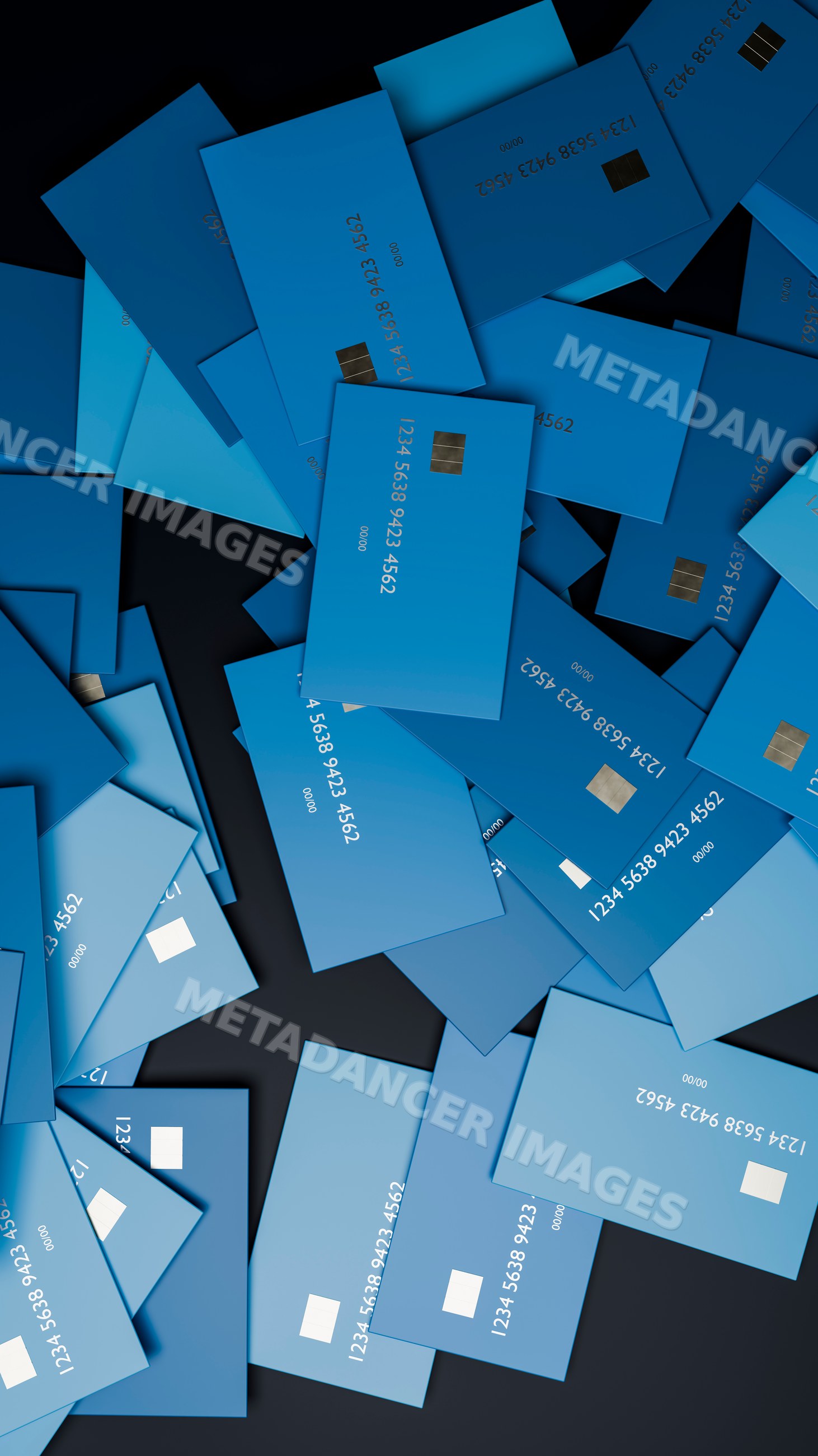 Scattered blue credit cards with payment chips on a black surface