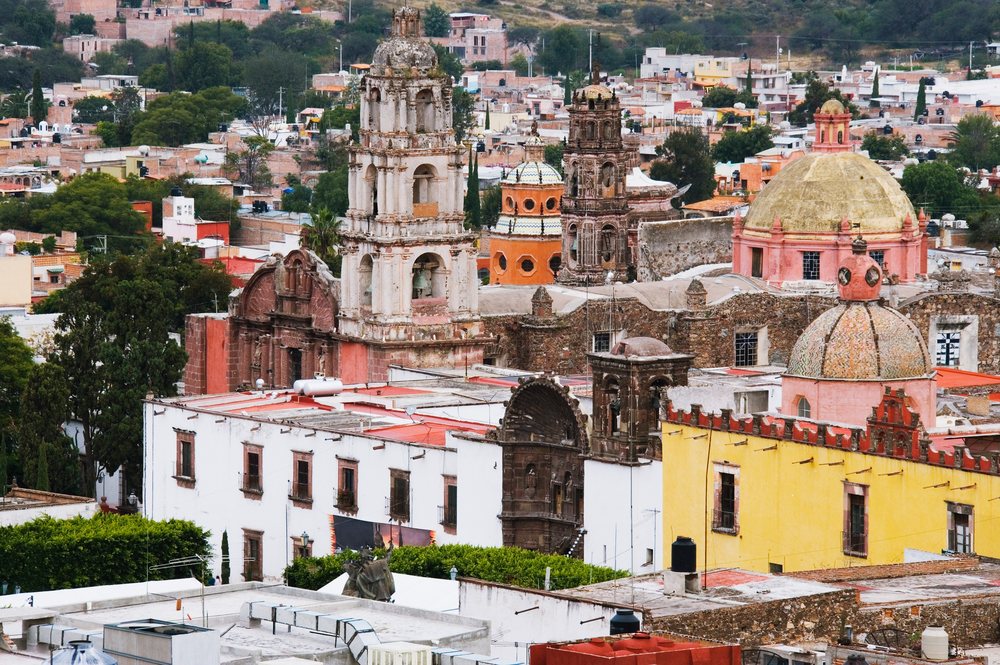 Cityscape with historic churches mexico