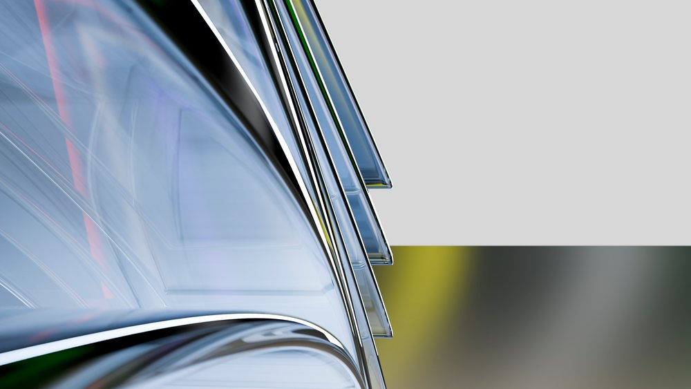 Stacked curved transparent glass panels with reflective surfaces