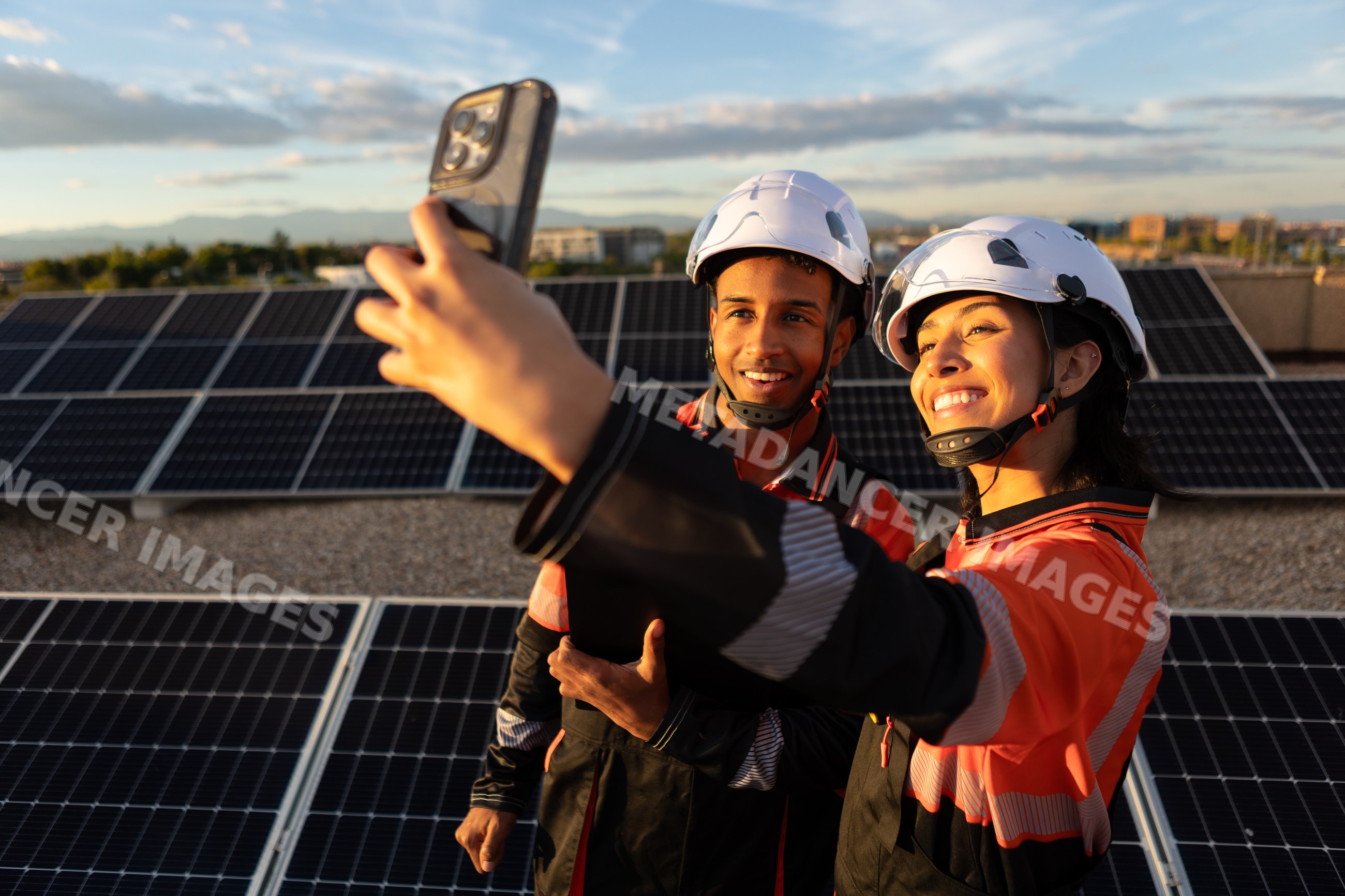 Two Hispanic workers taking a selfie