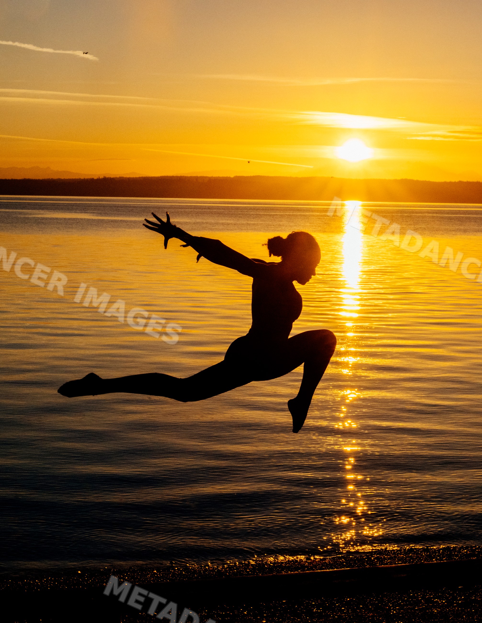 Silhouette of young Hispanic woman jumping