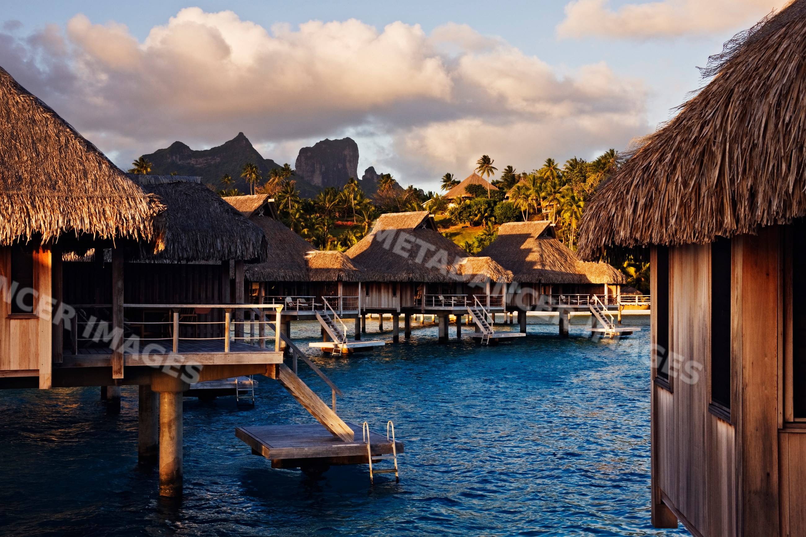 Overwater bungalows nui resort with mount otemanu