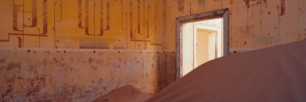 Sand-filled interior of abandoned building namibia