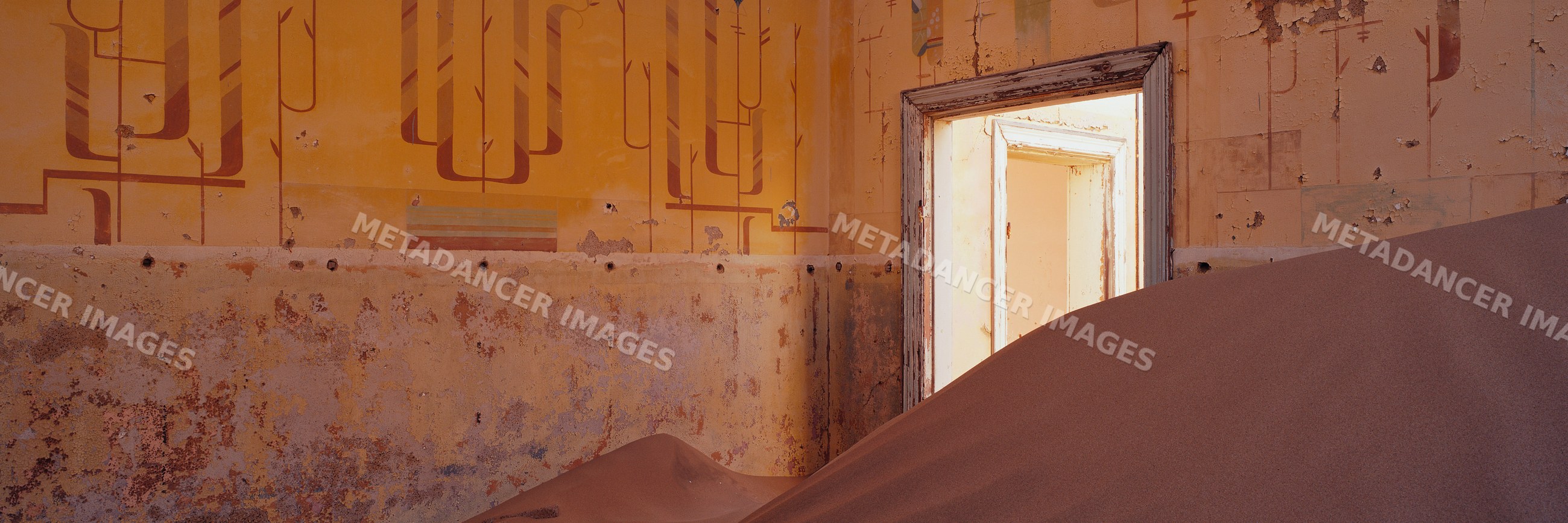 Sand-filled interior of abandoned building namibia