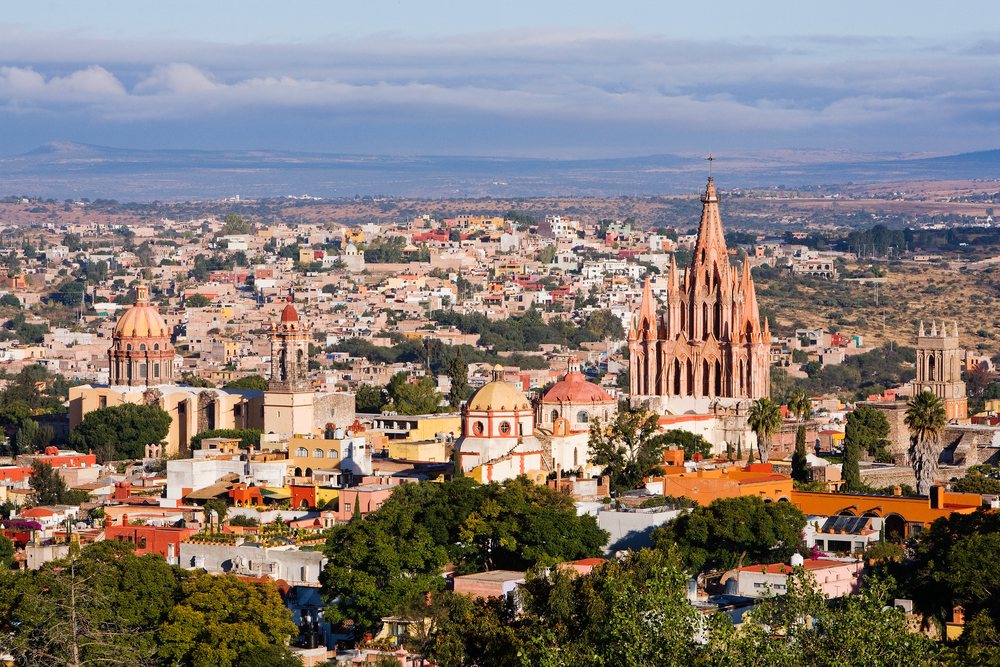 Cityscape of san miguel de allende with historic churches and rooftops