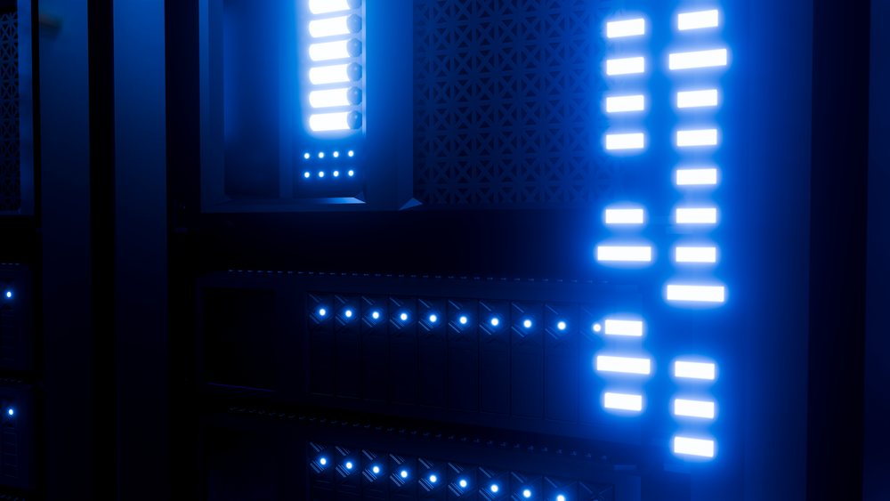 Server rack illuminated by blue led lights in data center