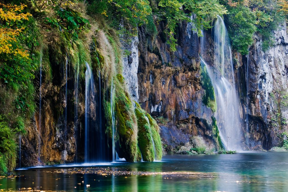 Waterfalls flowing over mossy cliffs croatia