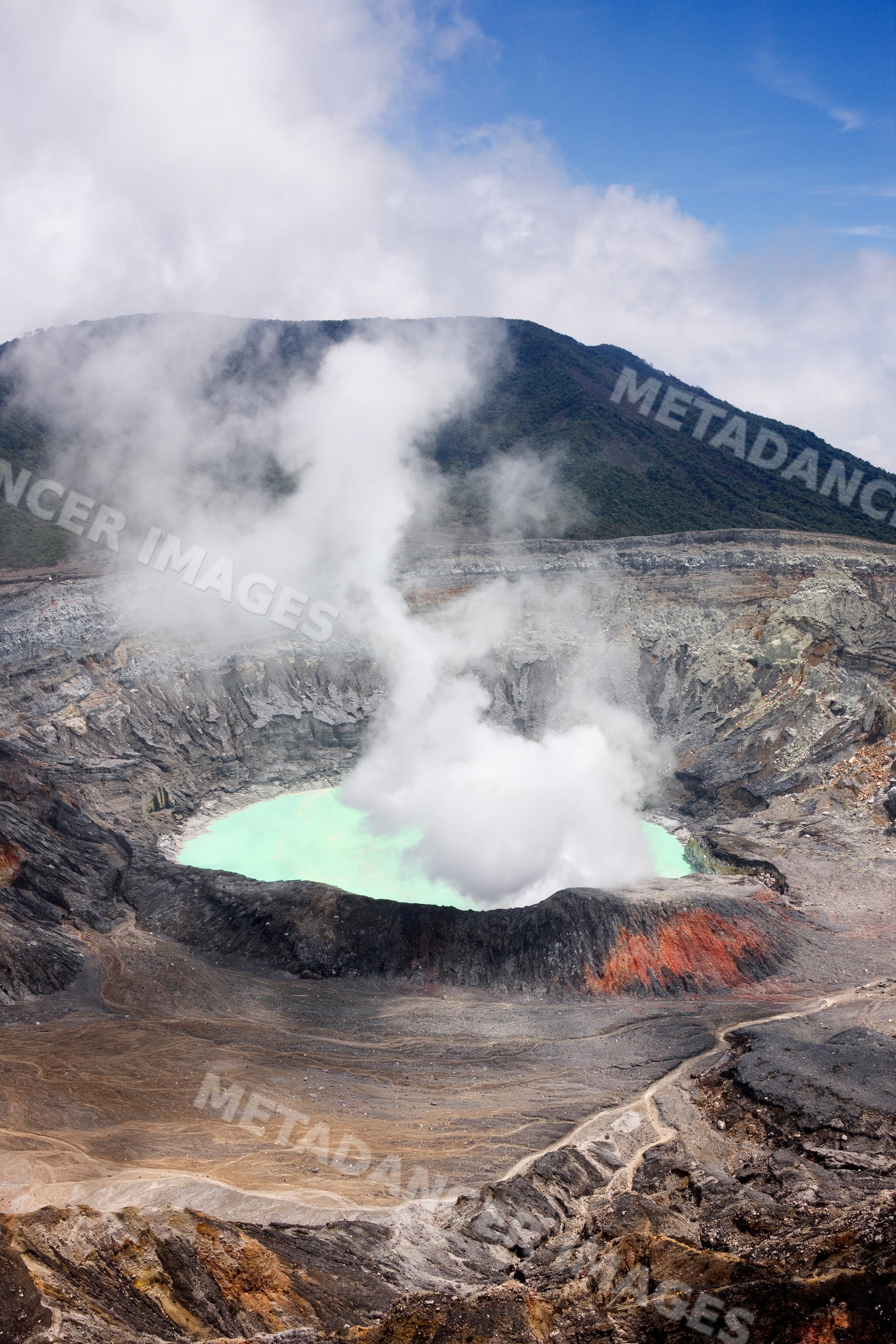 Poas volcano crater steam and acidic lake