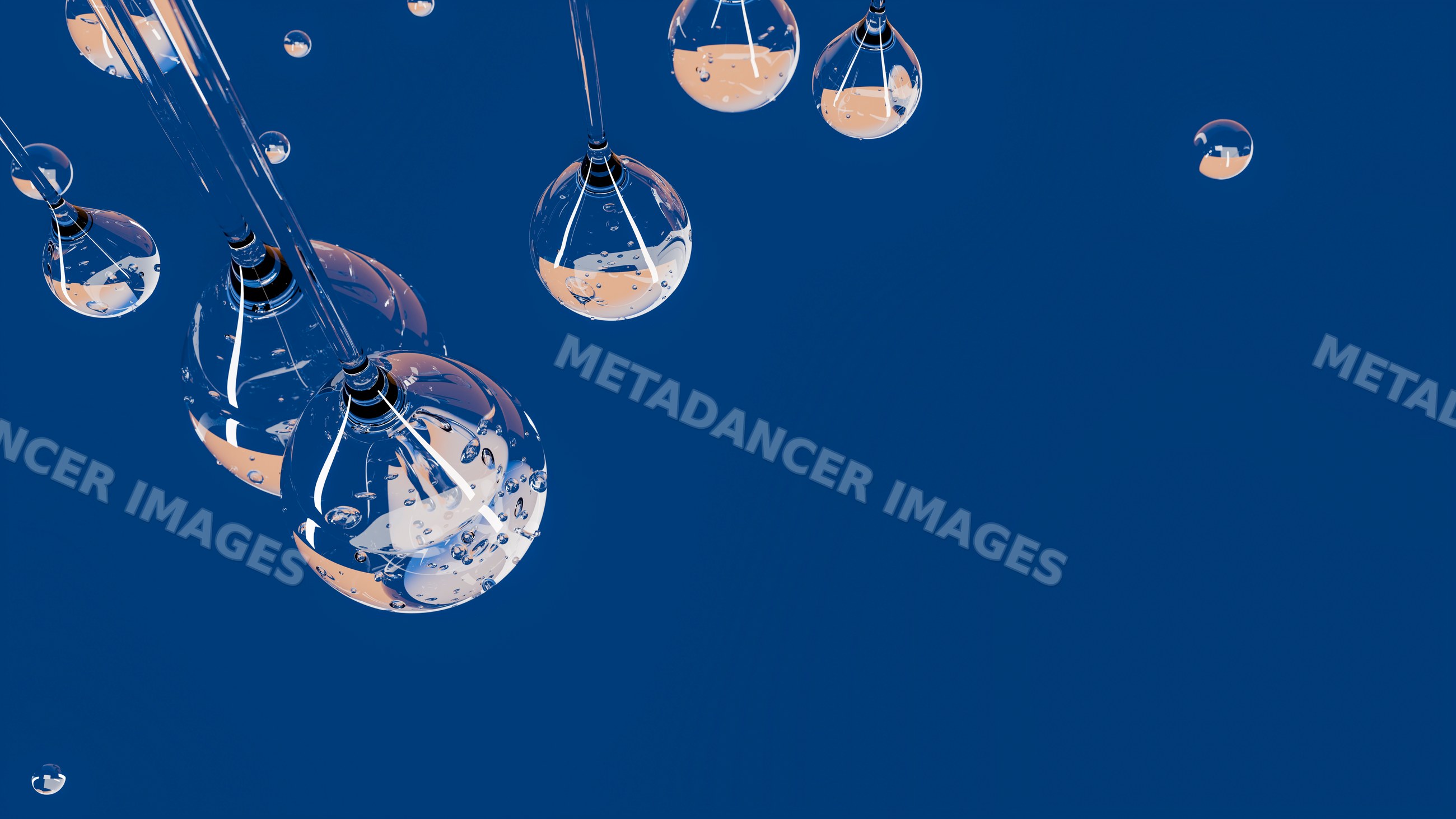 Transparent water droplets suspended against blue background