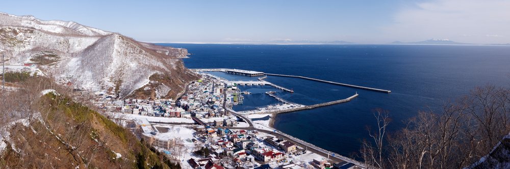 Fishing port on shiretoko peninsula in snowy hokkaido, japan