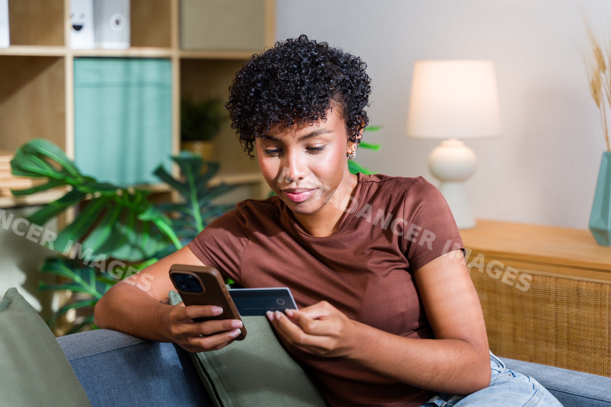 African American woman using smartphone for online payment