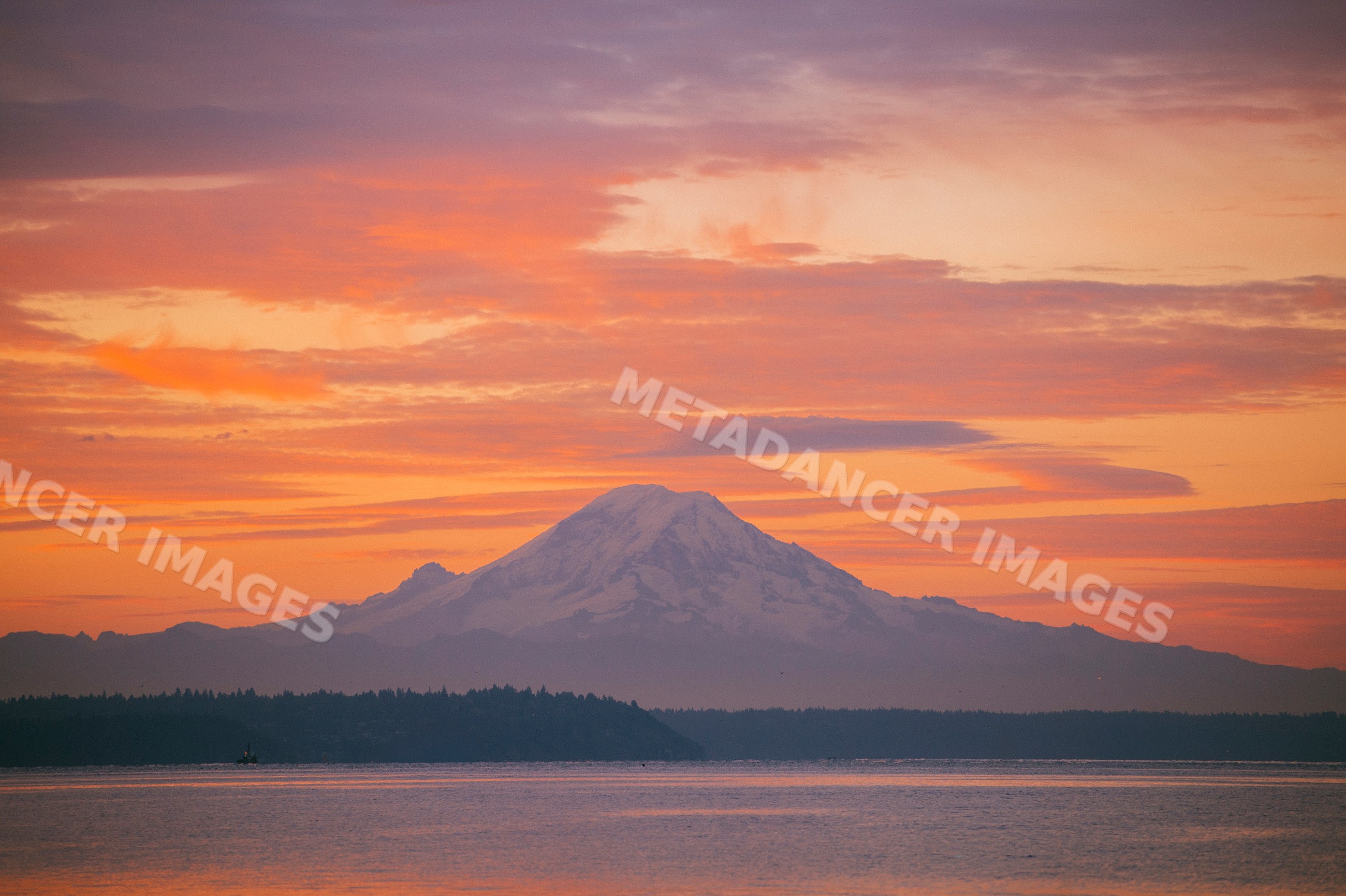 Mount rainier at sunset over water on Bainbridge Island