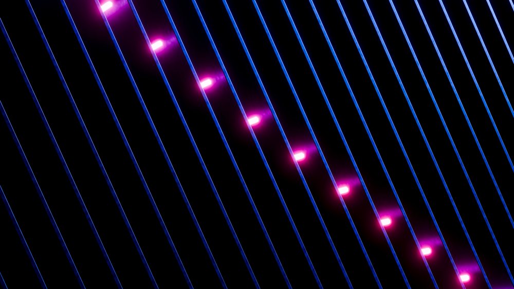 Blue curved lines with glowing purple neon lights on black background