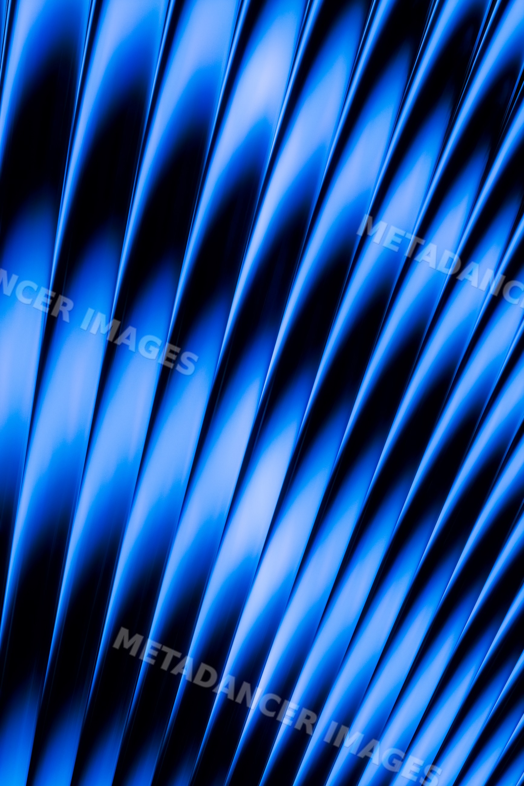 Abstract blue diagonal wave pattern with gradient lighting