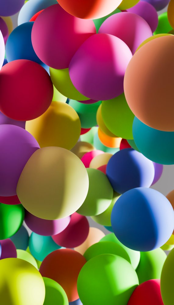 A cluster of colorful floating spheres creating an abstract vibrant