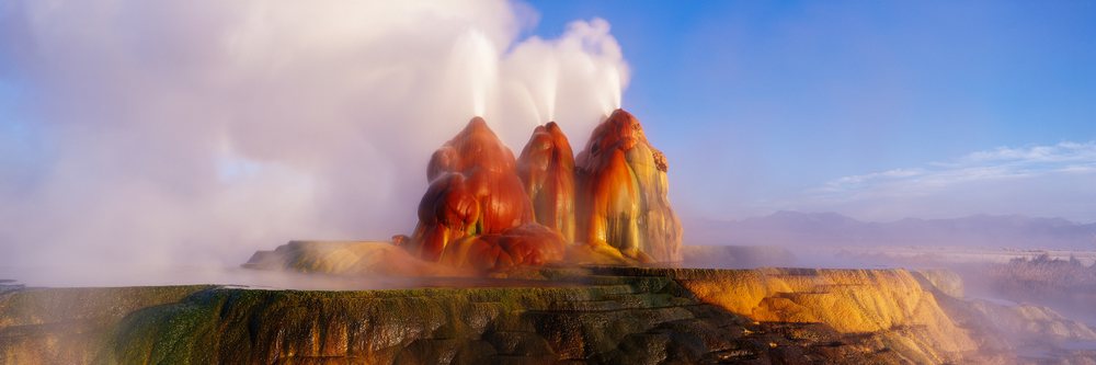 Fly geyser geothermal eruption with steam