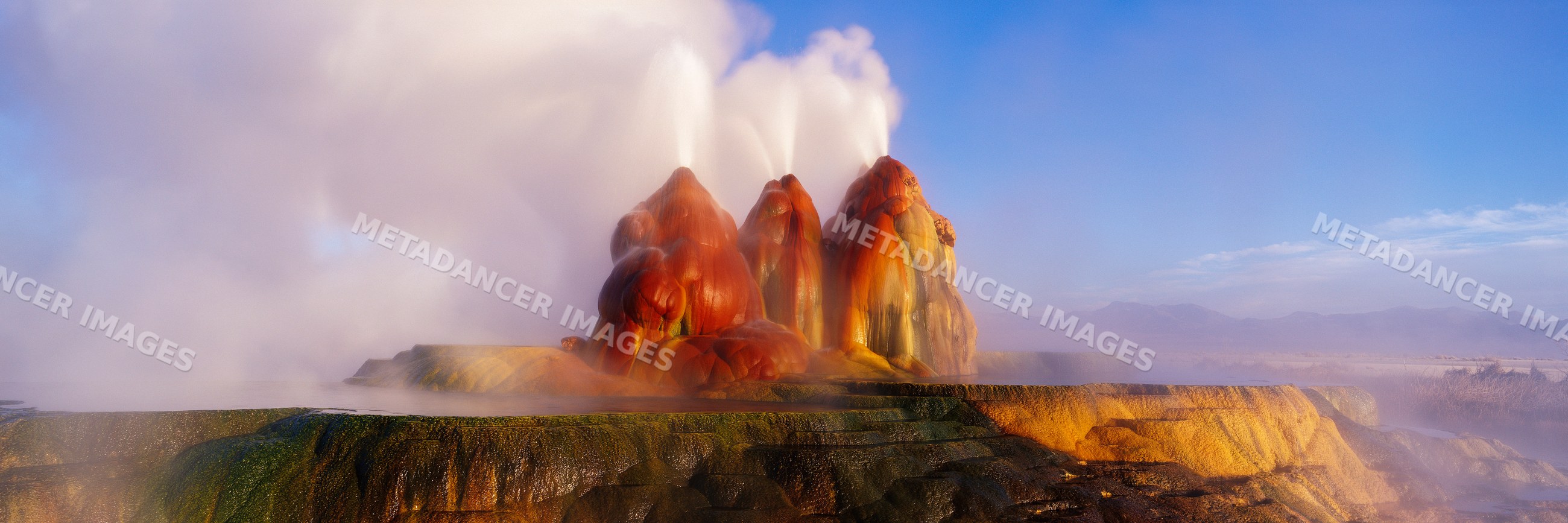 Fly geyser geothermal eruption with steam
