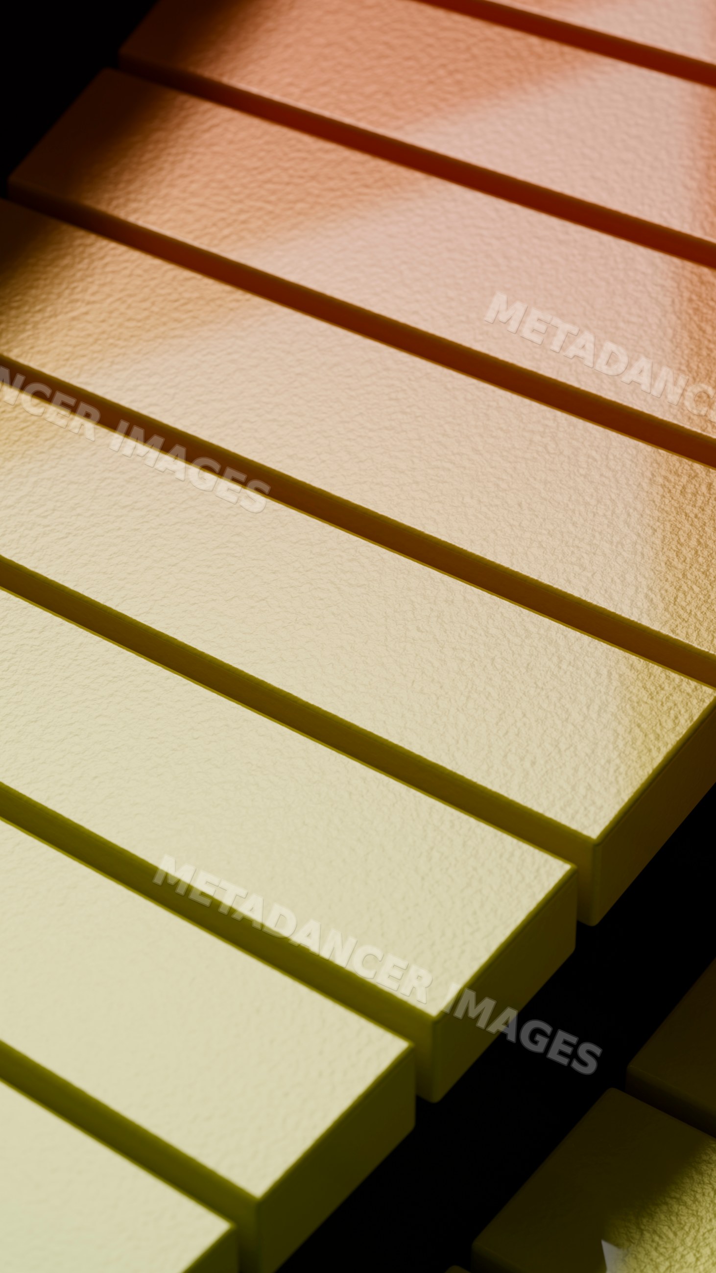 Close-up of yellow piano keys with black keys in shadow